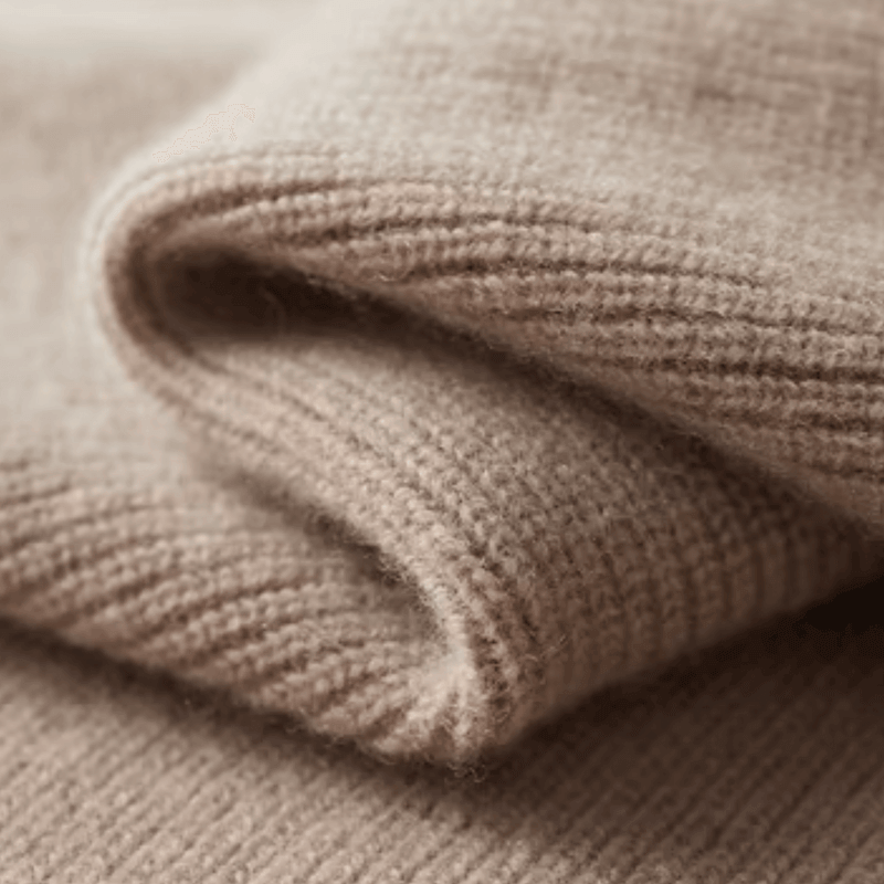 Close-up of a folded beige knitted fabric