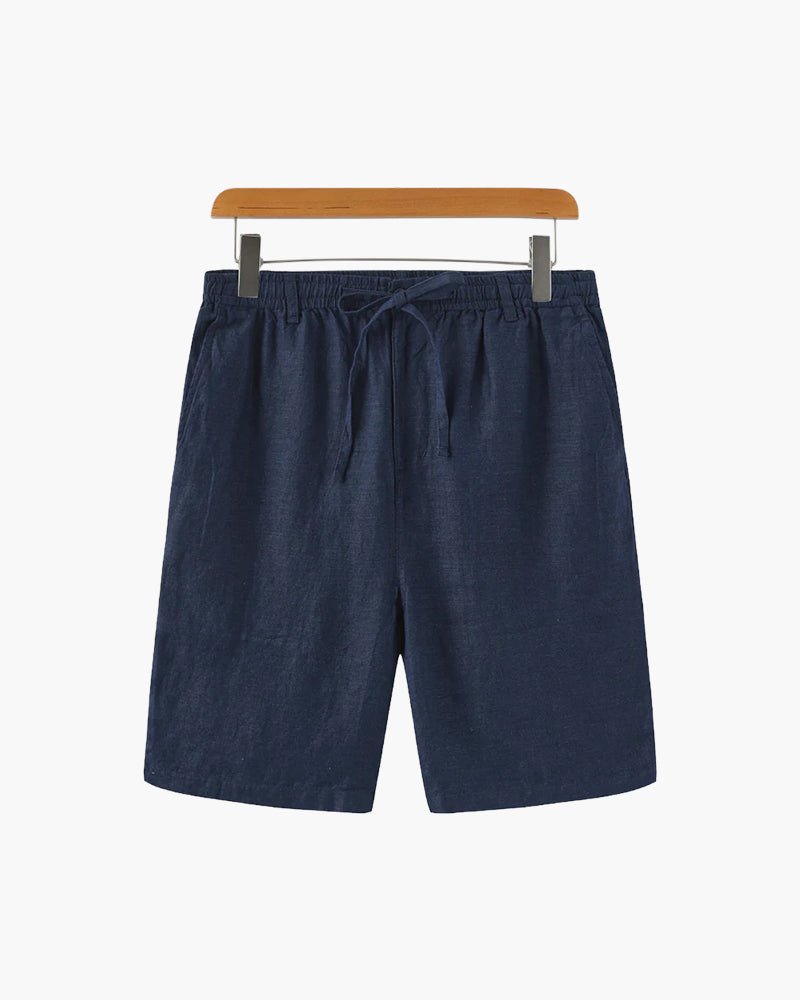 Men's navy blue linen shorts with deep-set side pockets and a structured straight-leg silhouette.