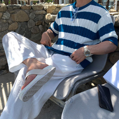 Men's blue and white striped cable knit t-shirt featuring a premium textured weave and classic nautical style.