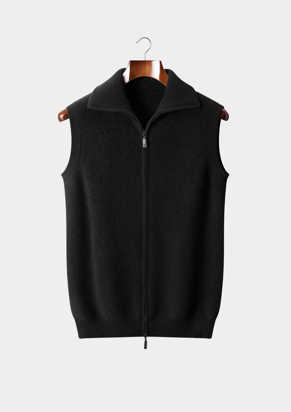 Sophisticated black cashmere zip-up vest for men, showcasing a premium fine-gauge knit and minimalist design.
