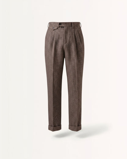 Men's brown houndstooth merino wool fabric texture focusing on double front pleat crease