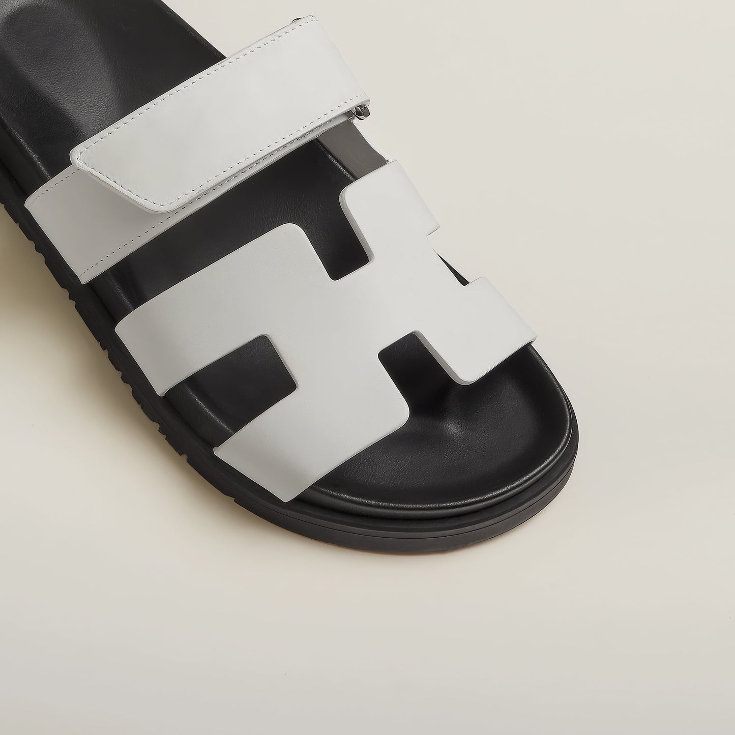 THE "RIVIERA" CUTOUT LEATHER SLIDES