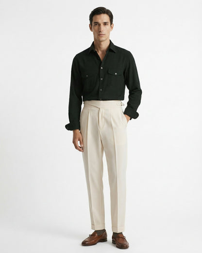 Off-white Gurkha waistband double pleated trousers worn with black button down shirt