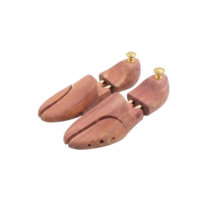 Two wooden shoe tree stands with adjustable brass knobs