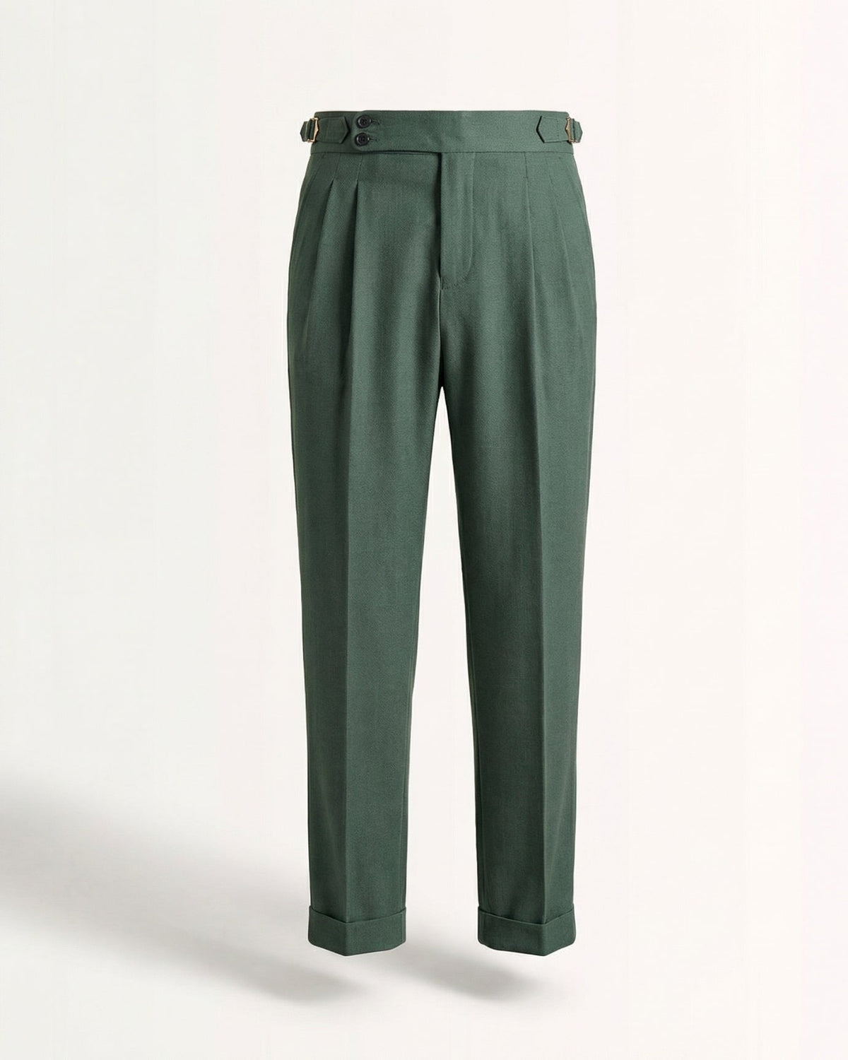 Tailored forest green double pleated high waisted trousers with side adjusters and cuffed hem front view