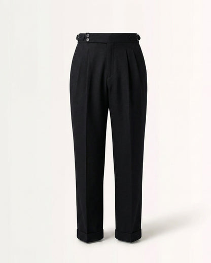 Tailored black double pleated high waisted trousers with side adjusters and cuffed hem front view