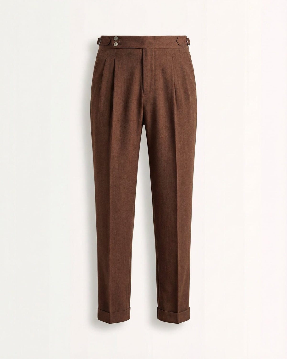 Tailored brown double pleated high waisted trousers with side adjusters and cuffed hem front view