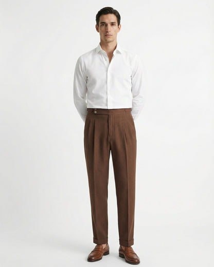 Men's tailored brown double pleated high waisted trousers with side adjusters and cuffed hem front view