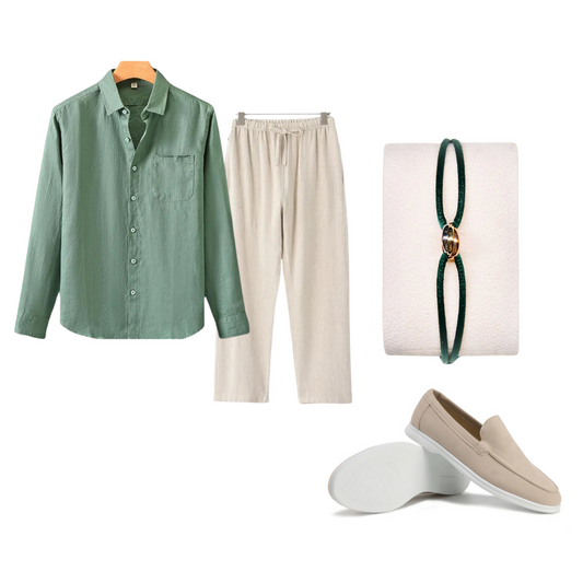 Green linen shirt and beige pants with a bracelet and loafers on a white background