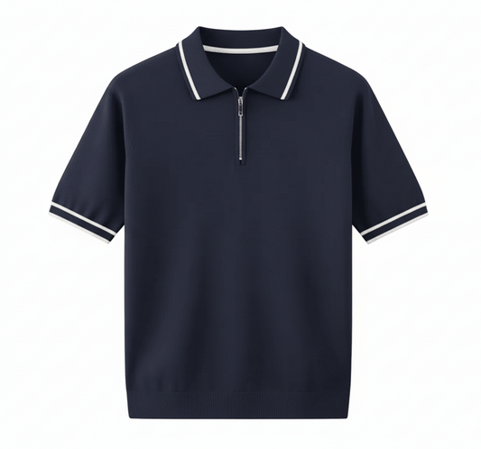 Men's navy blue knitted quarter-zip polo with a white contrast tipped collar and matching white sleeve trim.