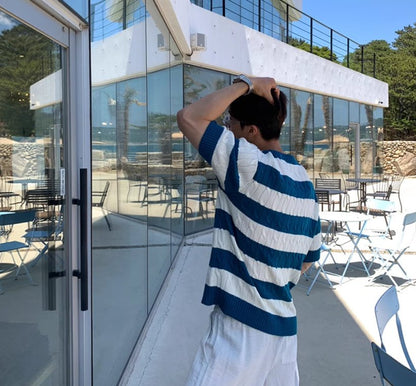 Men's blue and white striped cable knit t-shirt featuring a premium textured weave and classic nautical style.