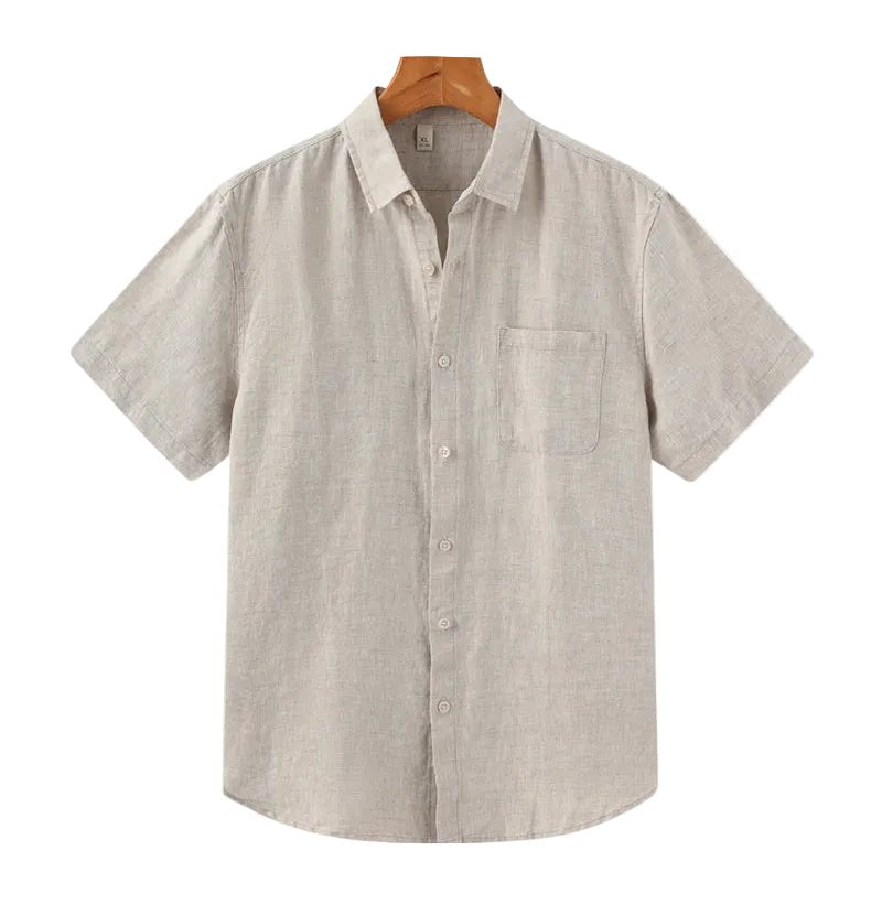 Men's beige short sleeve linen shirt featuring a natural slub texture, chest pocket, and a relaxed tailored fit.