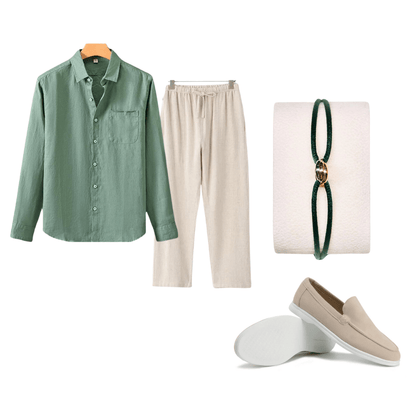 Green linen shirt and beige pants with a bracelet and loafers on a white background
