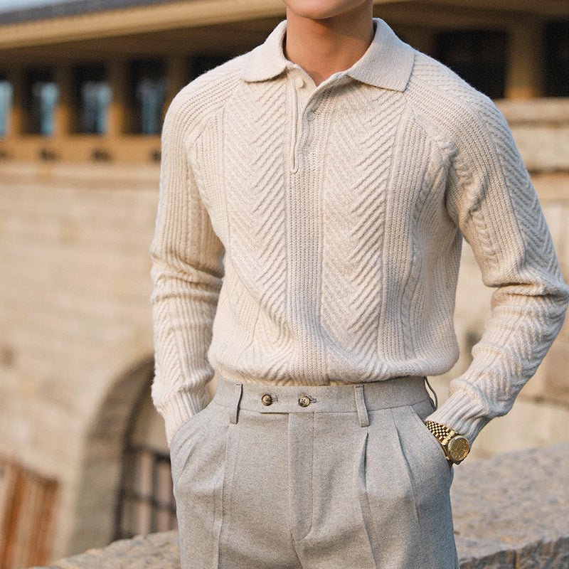 Men's ivory chevron cable knit polo pullover featuring an intricate textured design and three-button collar.
