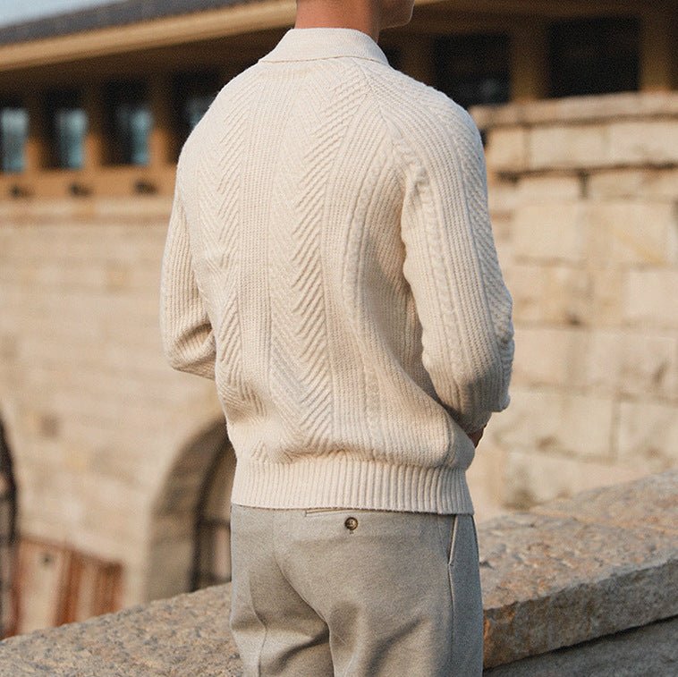 Men's ivory chevron cable knit polo pullover featuring an intricate textured design and three-button collar.