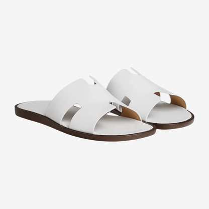 Clean white leather summer sandals for men, showcasing a sophisticated smart-casual silhouette.