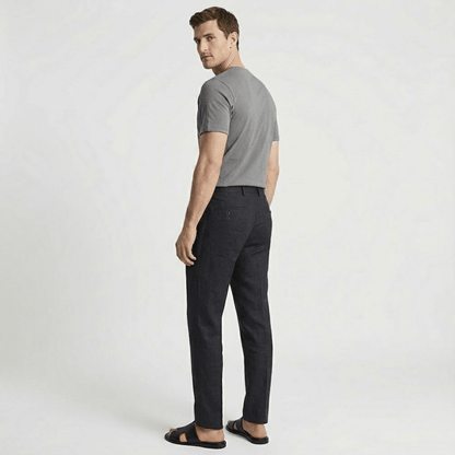 Men's black classic leather cross-strap sandals featuring a smooth finish and a padded comfort insole.