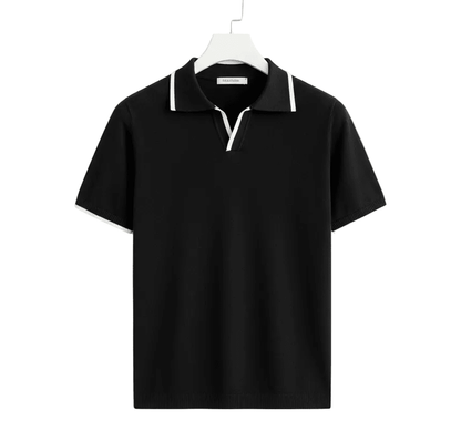 Premium black cotton V-neck polo showcasing a white duo-tone tipped collar and a tailored, deconstructed fit.