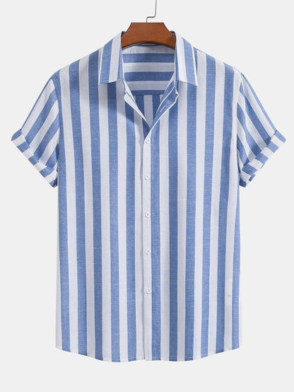 Blue and white striped shirt on a hanger against a white background