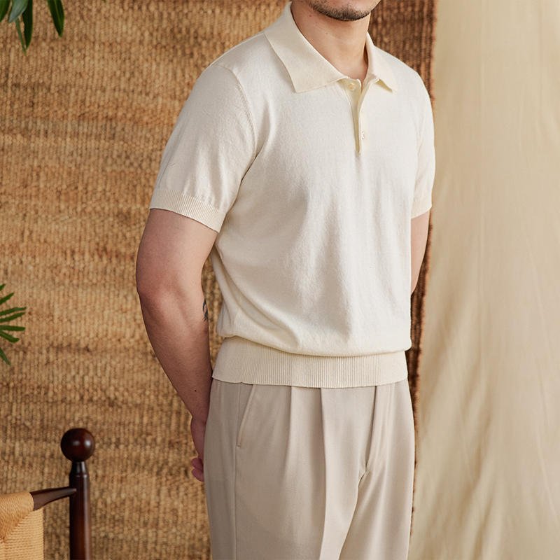 Men's elegant beige cotton-linen polo showcasing a sophisticated natural texture and a tailored athletic silhouette.