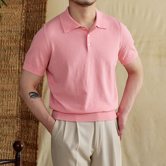 Men's soft pink knit polo in a breathable cotton-linen blend, featuring a classic button placket and refined ribbed detailing.