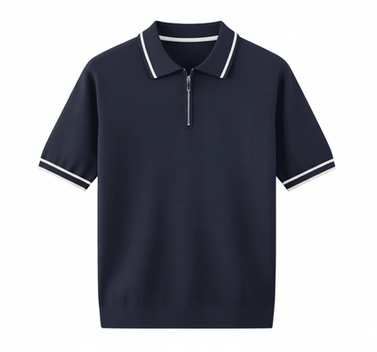 Men's navy blue knitted quarter-zip polo with a white contrast tipped collar and matching white sleeve trim.