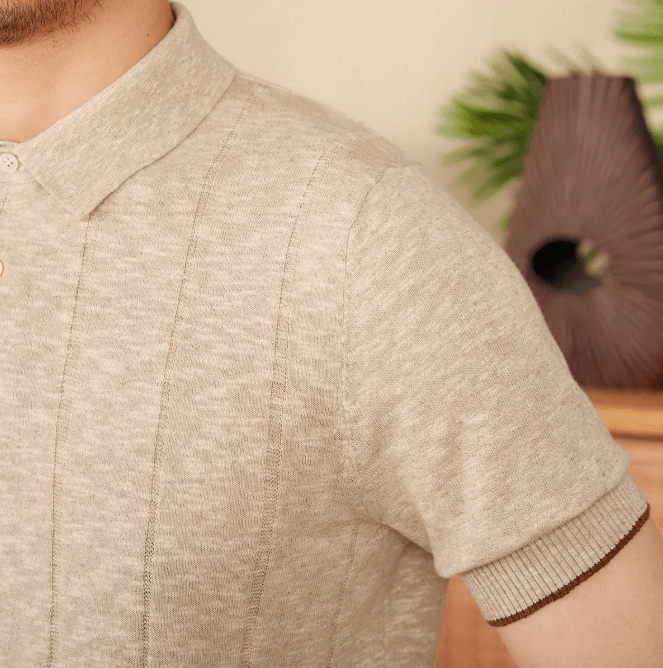 Sophisticated beige ribbed knit polo for men featuring a three-button front and breathable linen-cotton blend.