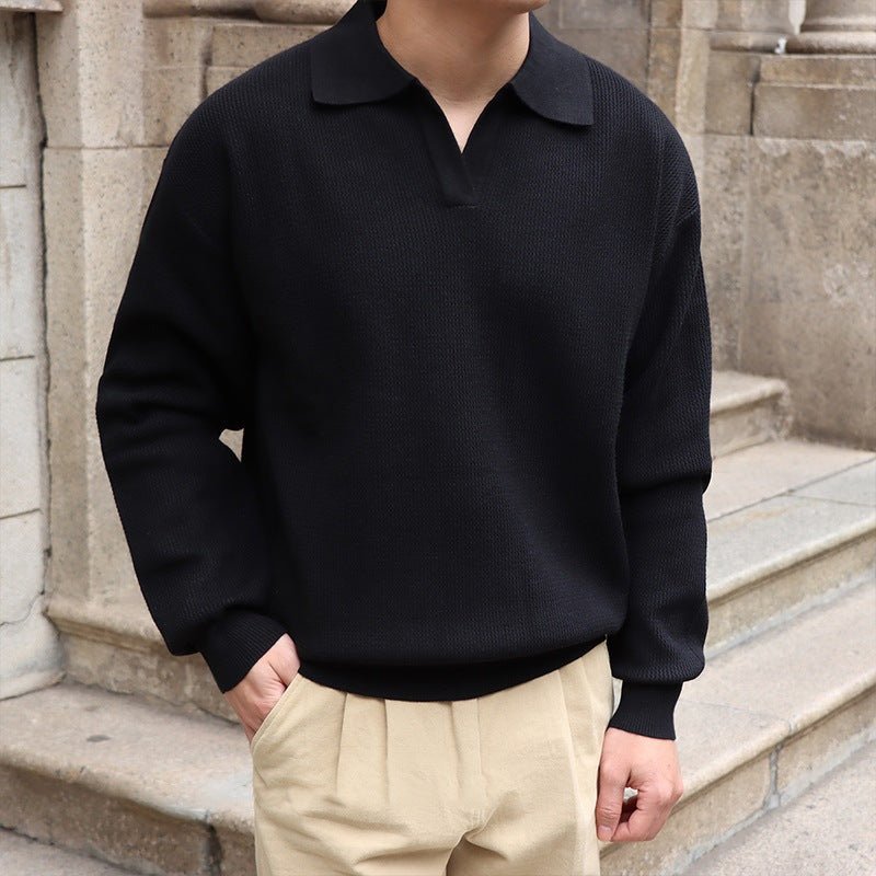 Classic black buttonless V-neck long sleeve polo for men, showcasing a breathable textured weave and relaxed professional silhouette.
