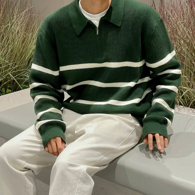 Men's green loose half-zip striped polo sweater with ivory contrast panels and a heavy-gauge ribbed cotton finish.