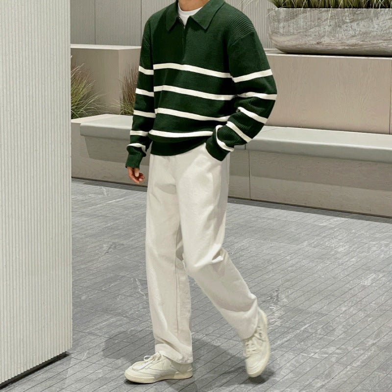 Men's green loose half-zip striped polo sweater with ivory contrast panels and a heavy-gauge ribbed cotton finish.