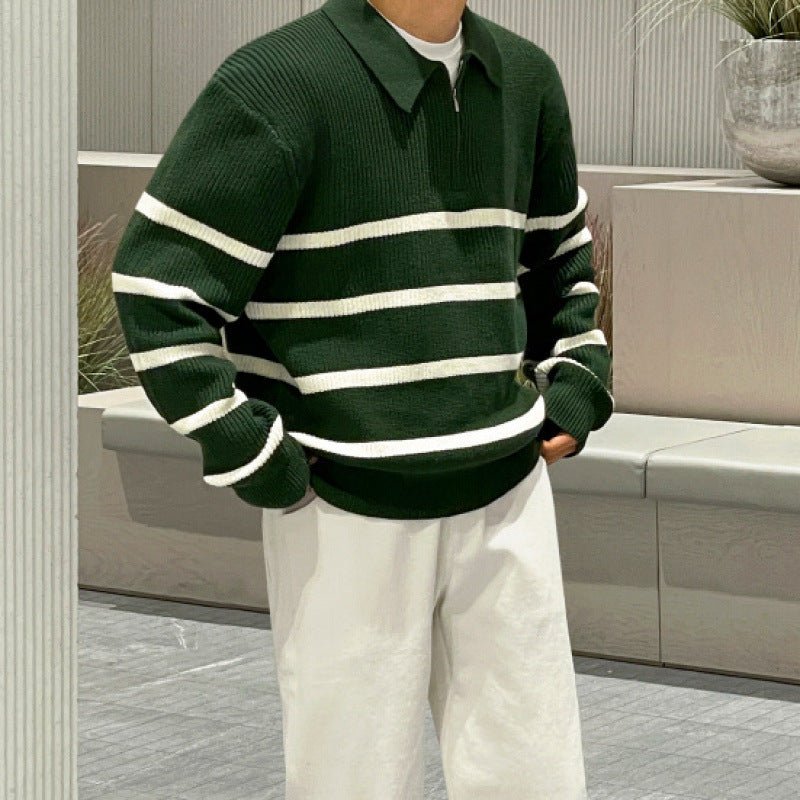 Men's green loose half-zip striped polo sweater with ivory contrast panels and a heavy-gauge ribbed cotton finish.