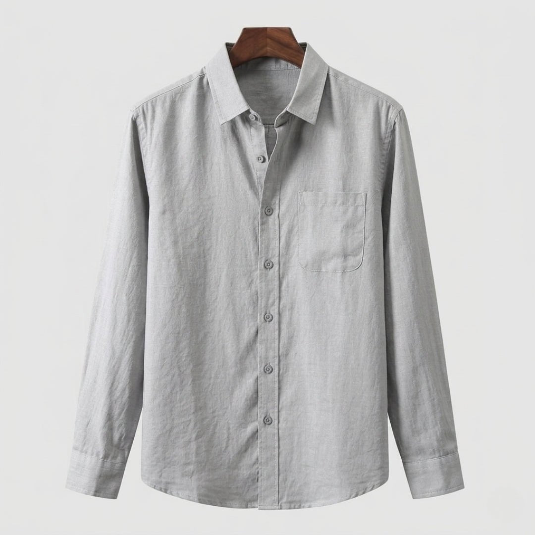 Men's charcoal gray linen shirt showcasing the organic slub texture of premium flax fibers.