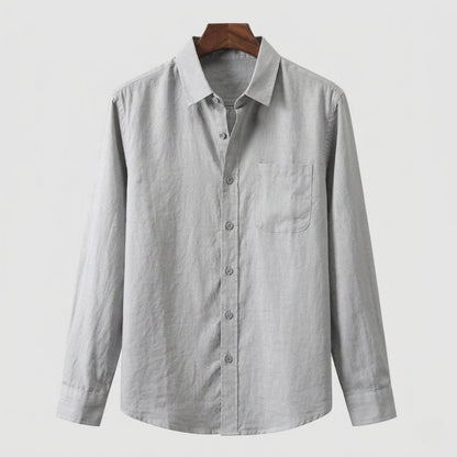 Men's charcoal gray linen shirt showcasing the organic slub texture of premium flax fibers.