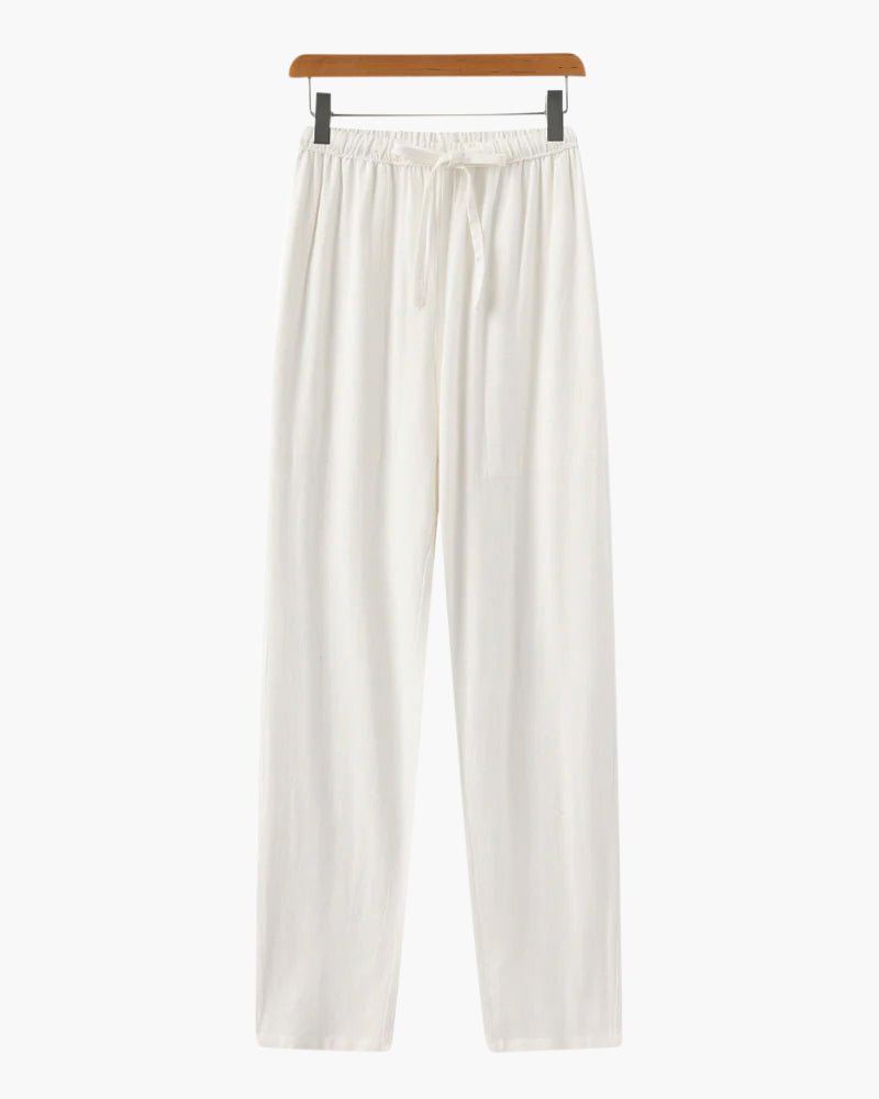 Premium Men's white straight linen trousers showcasing a crisp, breathable flax weave and a modern tailored fit.