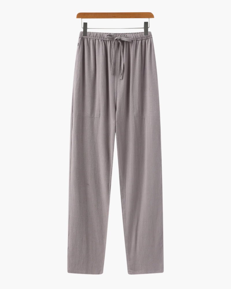 Men's charcoal gray straight linen pants designed with an ergonomic elasticated waist for all-day comfort.