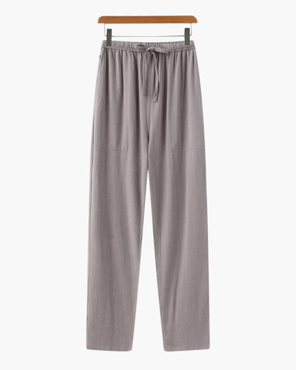 Men's charcoal gray straight linen pants designed with an ergonomic elasticated waist for all-day comfort.