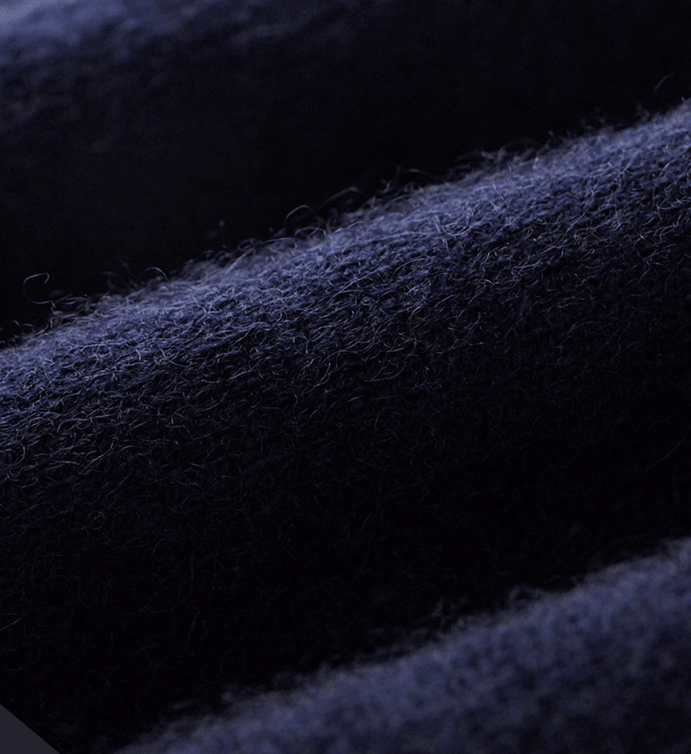 Close-up of dark blue fabric texture pure merino wool