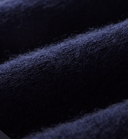 Close-up of dark blue fabric texture pure merino wool