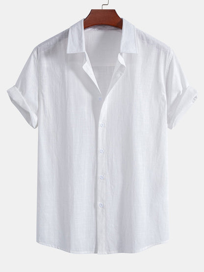 White short-sleeve shirt on a hanger against a white background