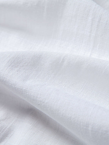 Close-up of white fabric with subtle texture