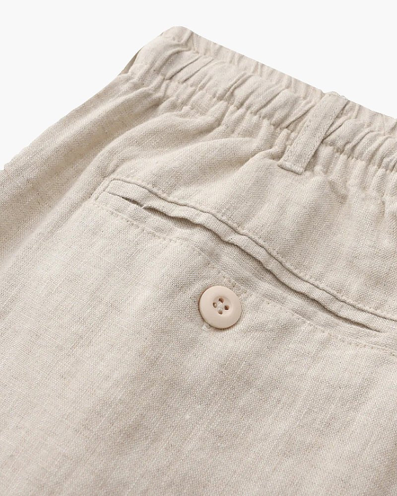 Men's beige 100% linen set featuring a short-sleeved button-down shirt and matching tailored shorts for a monochromatic Old Money look.