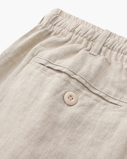 Men's beige 100% linen set featuring a short-sleeved button-down shirt and matching tailored shorts for a monochromatic Old Money look.
