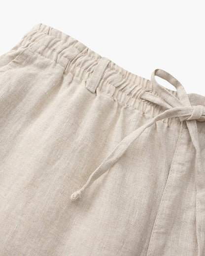 Men's beige 100% linen set featuring a short-sleeved button-down shirt and matching tailored shorts for a monochromatic Old Money look.