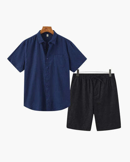 Classic navy blue linen shirt paired with black linen shorts, offering a sharp high-contrast look that stays cool in the heat.
