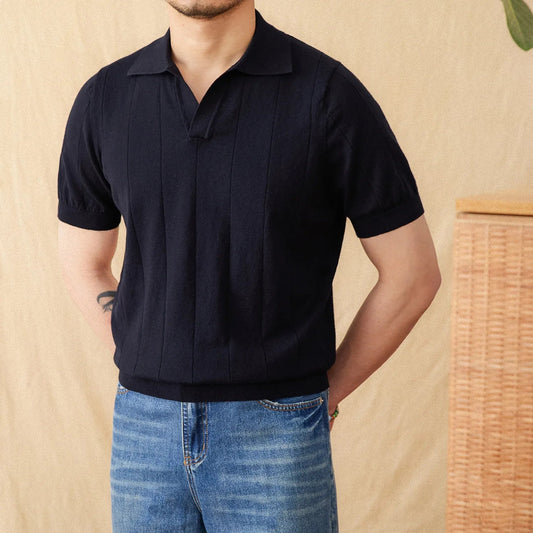 Premium Men's navy ribbed resort polo with a relaxed open neckline and a tailored, high-end fit.