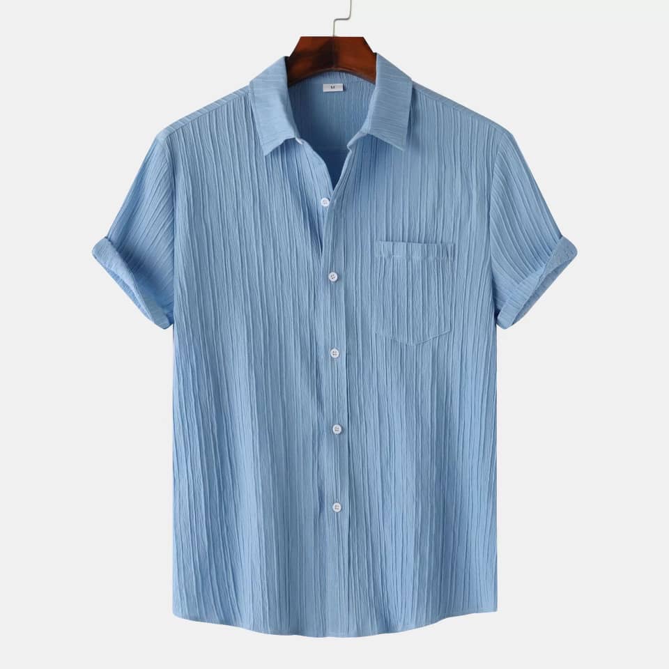 Blue striped shirt on a hanger against a white background