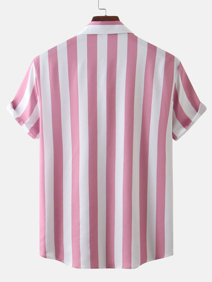 Pink and white striped shirt on a hanger against a white background