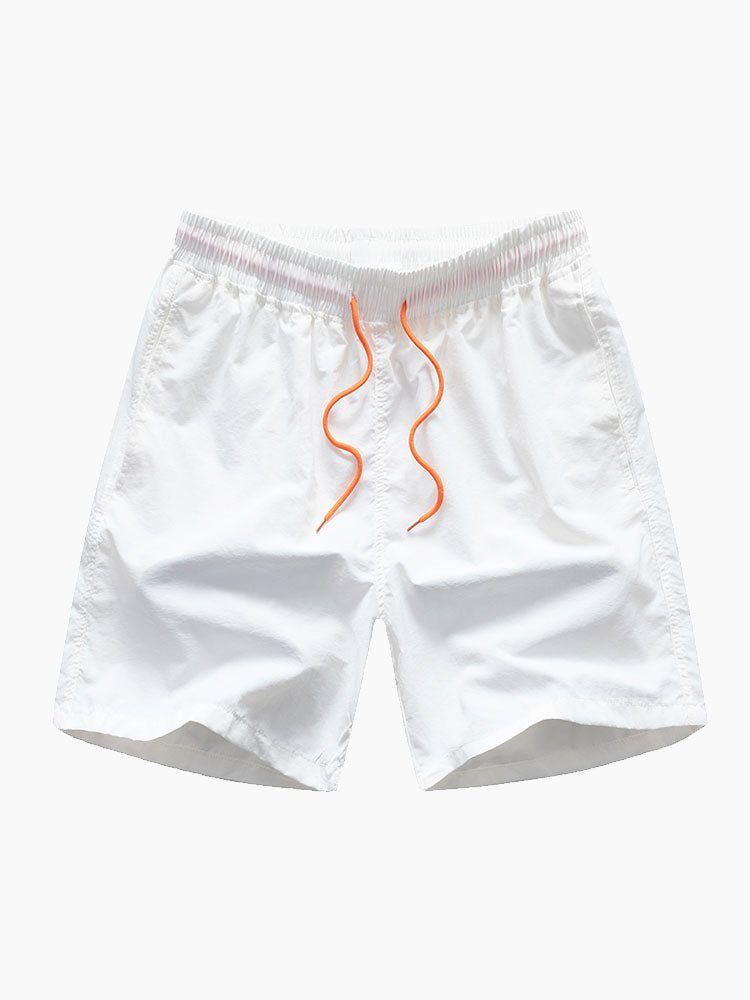 White shorts with orange drawstring on a white background