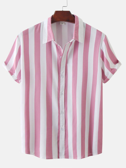 Pink and white striped shirt on a hanger against a white background