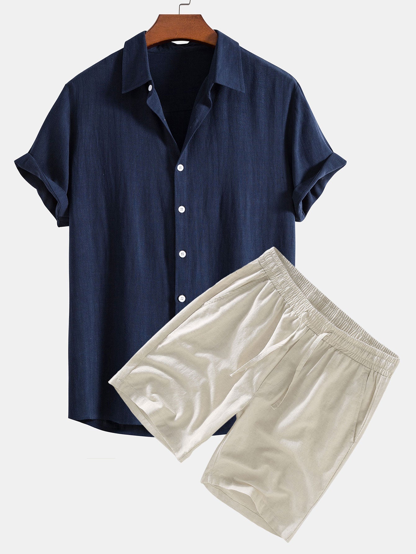 Navy shirt and beige shorts on a white background
